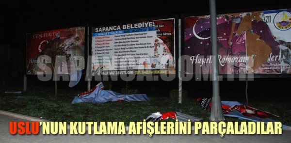 USLU’NUN KUTLAMA AFİŞLERİNİ PARÇALADILAR