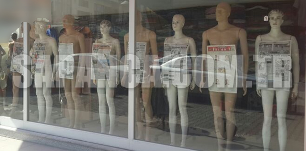 VİTRİN MANKENLERİNE GAZETE KAĞITLI ÖNLEM