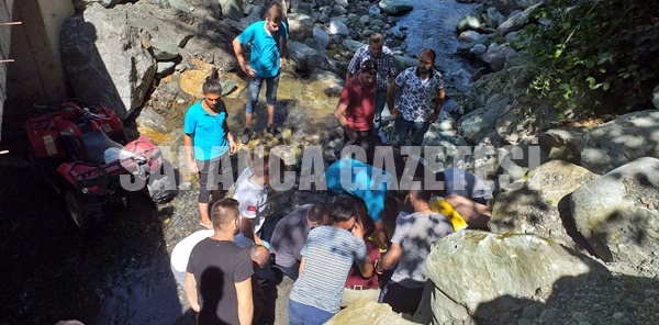 DEREYE UÇAN ATV'DEKİ 2 KİŞİ YARALANDI